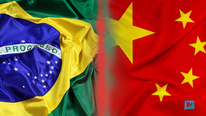 O prefeito Bandeiras do Brasil e da China; lei municipal cria pr